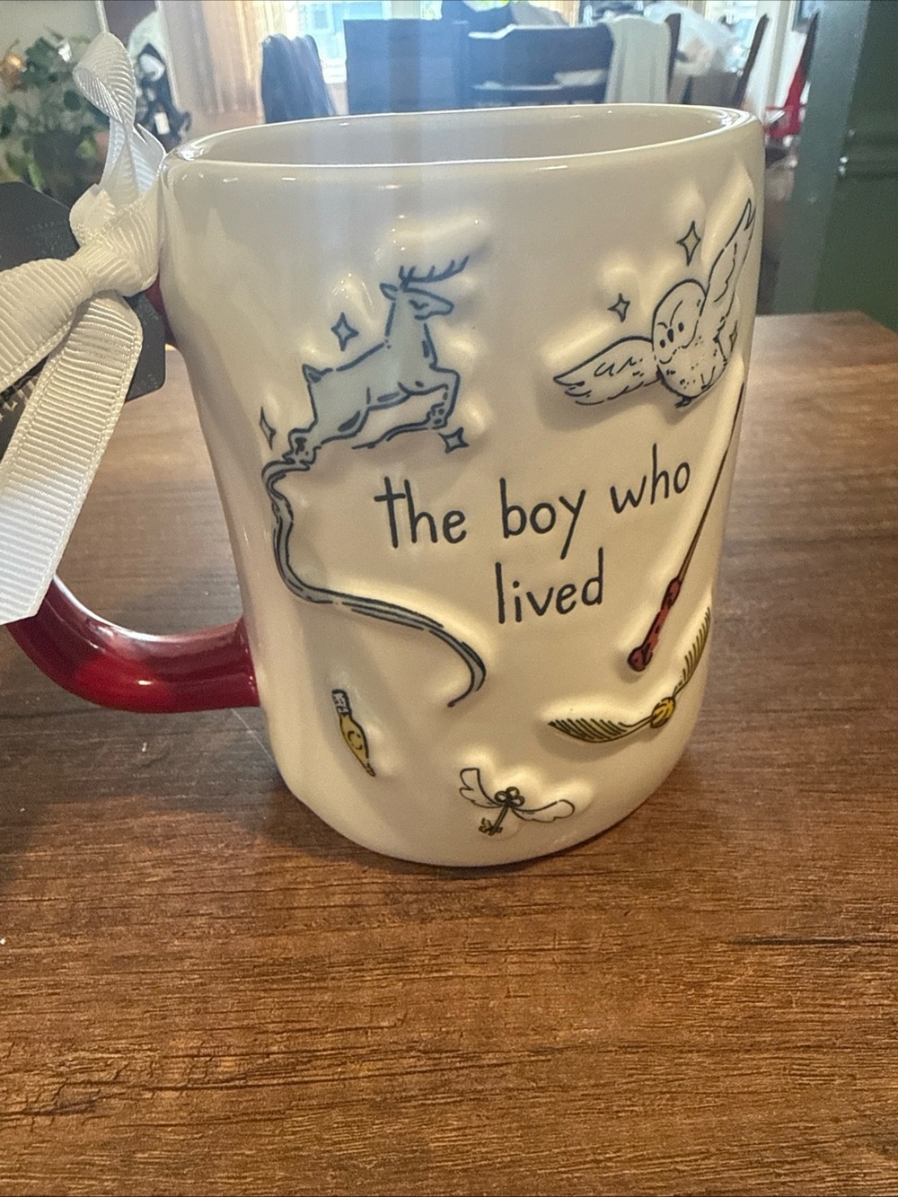 Rae Dunn White Ceramic 'the boy who lived' Mug with Red Handle